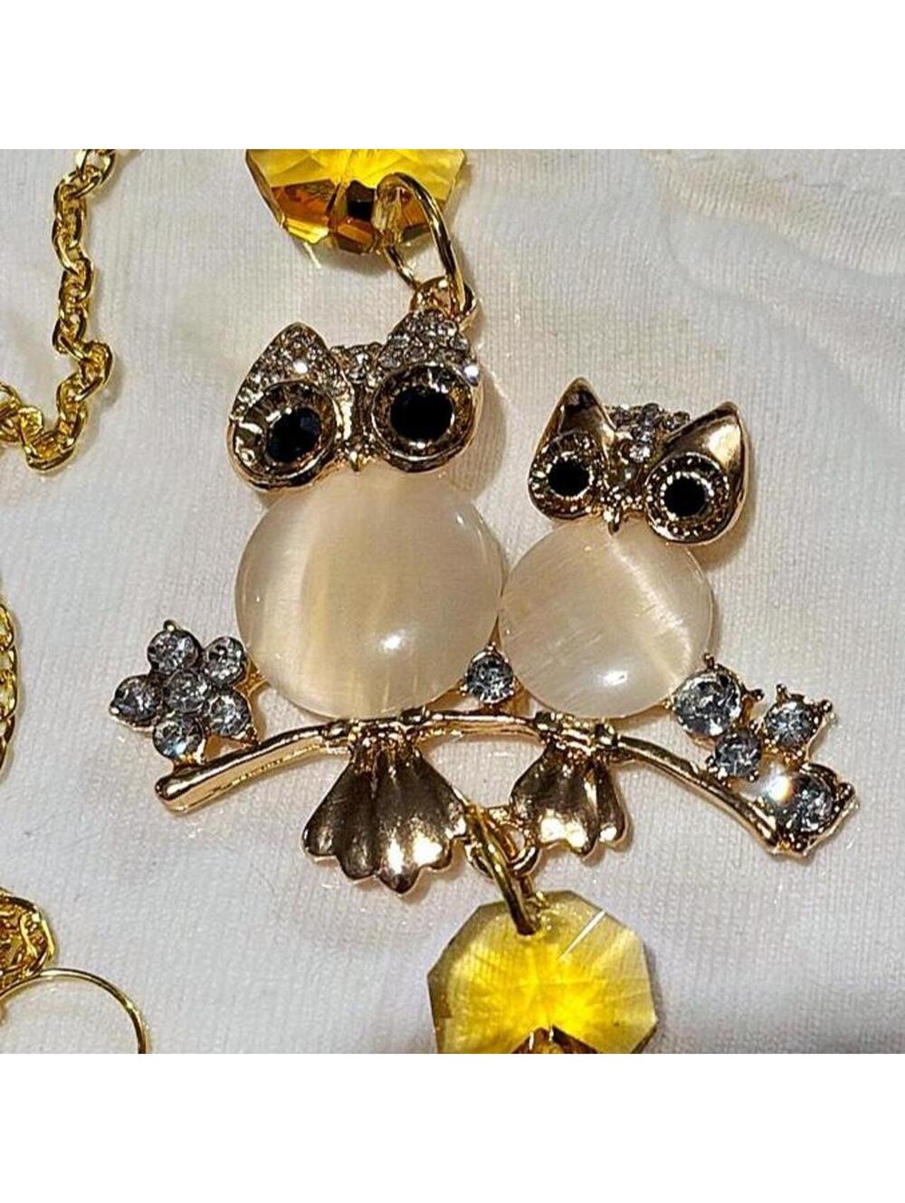 Gold-tone double owl suncatcher / car rearview mirror w/faux cat’s eye charms